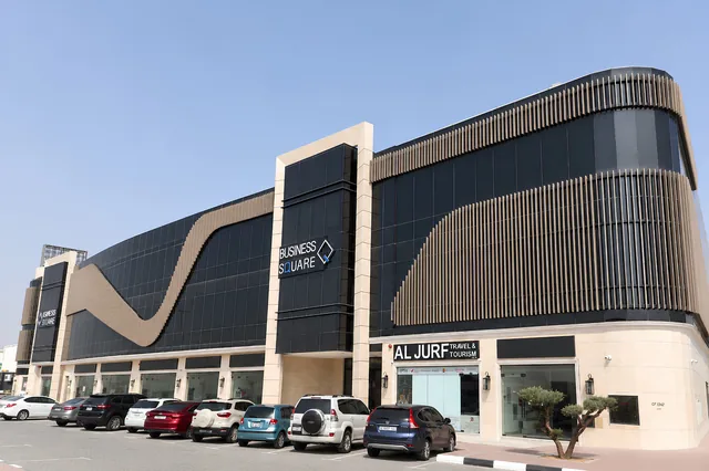 Street elevation of Business Square showing the full cladding run
