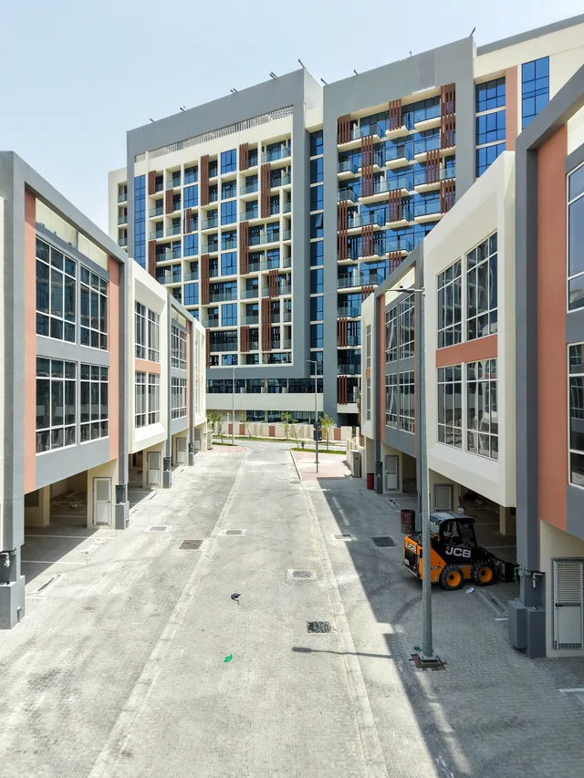 Aerial view of the Wardana G+10 building and surrounding development