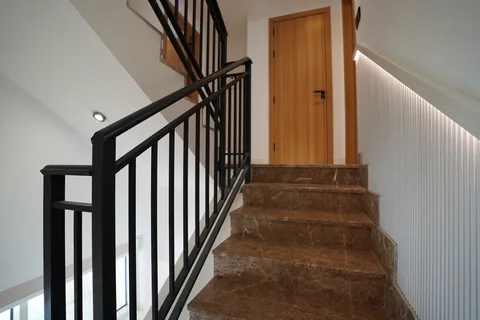Black steel staircase balustrade in a completed Wardana townhouse